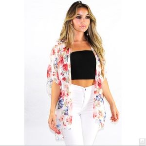 Floral 3/4 sleeve kimono. 100% polyester.